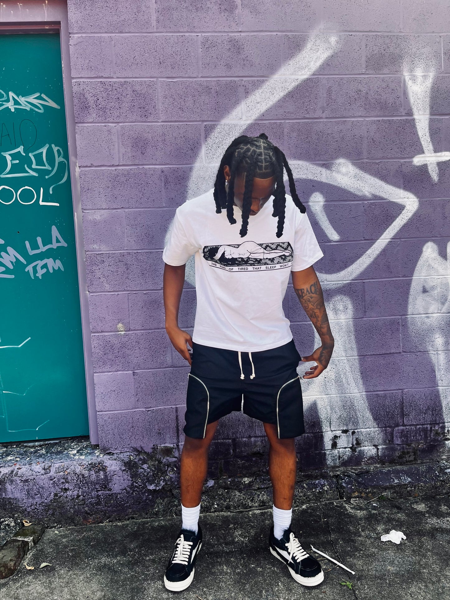 “drained” tee